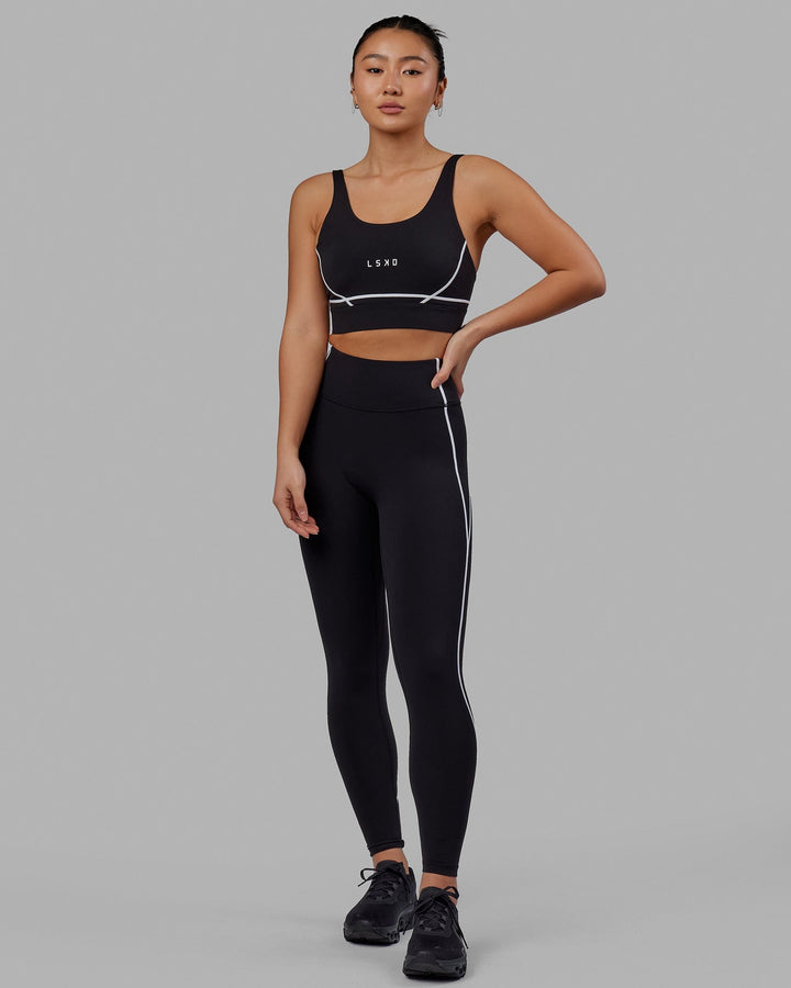 Woman wearing Pulse Sports Bra - Black