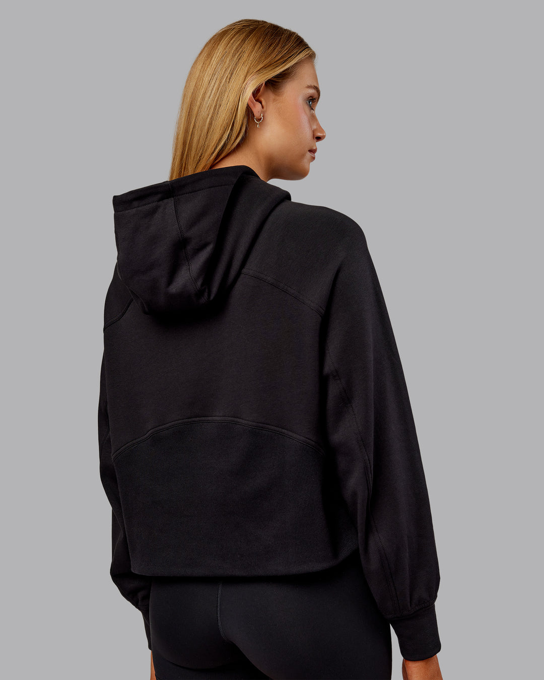 Woman wearing Pursue Mid-Weight Hoodie - Black | Model:Ella | Size:S