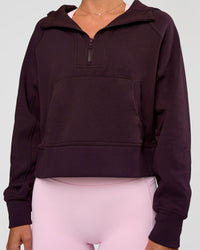 Woman wearing Pursue Mid-Weight Hoodie - Midnight Plum | Model:Amity | Size:S