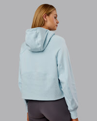 Woman wearing Pursue Mid-Weight Hoodie - Skyride | Model:Ella | Size:S