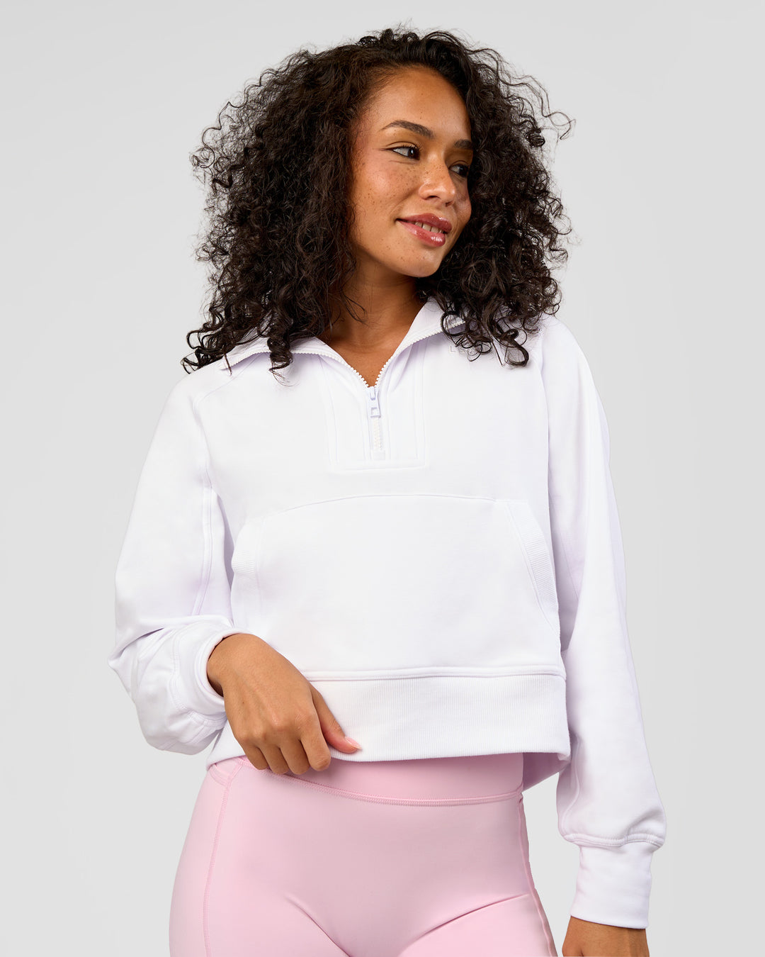 Woman wearing Pursue Mid-Weight Hoodie - White | Model:Jasmine | Size:S