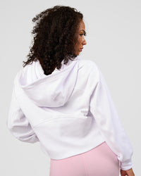 Woman wearing Pursue Mid-Weight Hoodie - White | Model:Jasmine | Size:S