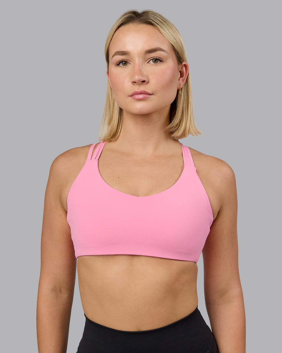 Woman wearing Push The Limit Sports Bra - Candy Pink | Model:Halle | Size:S