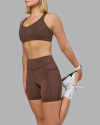 Woman wearing Push The Limit Sports Bra in Chocolate Martini | Model:Halle | Size:S