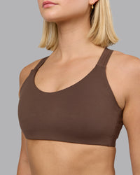 Woman wearing Push The Limit Sports Bra in Chocolate Martini | Model:Halle | Size:S
