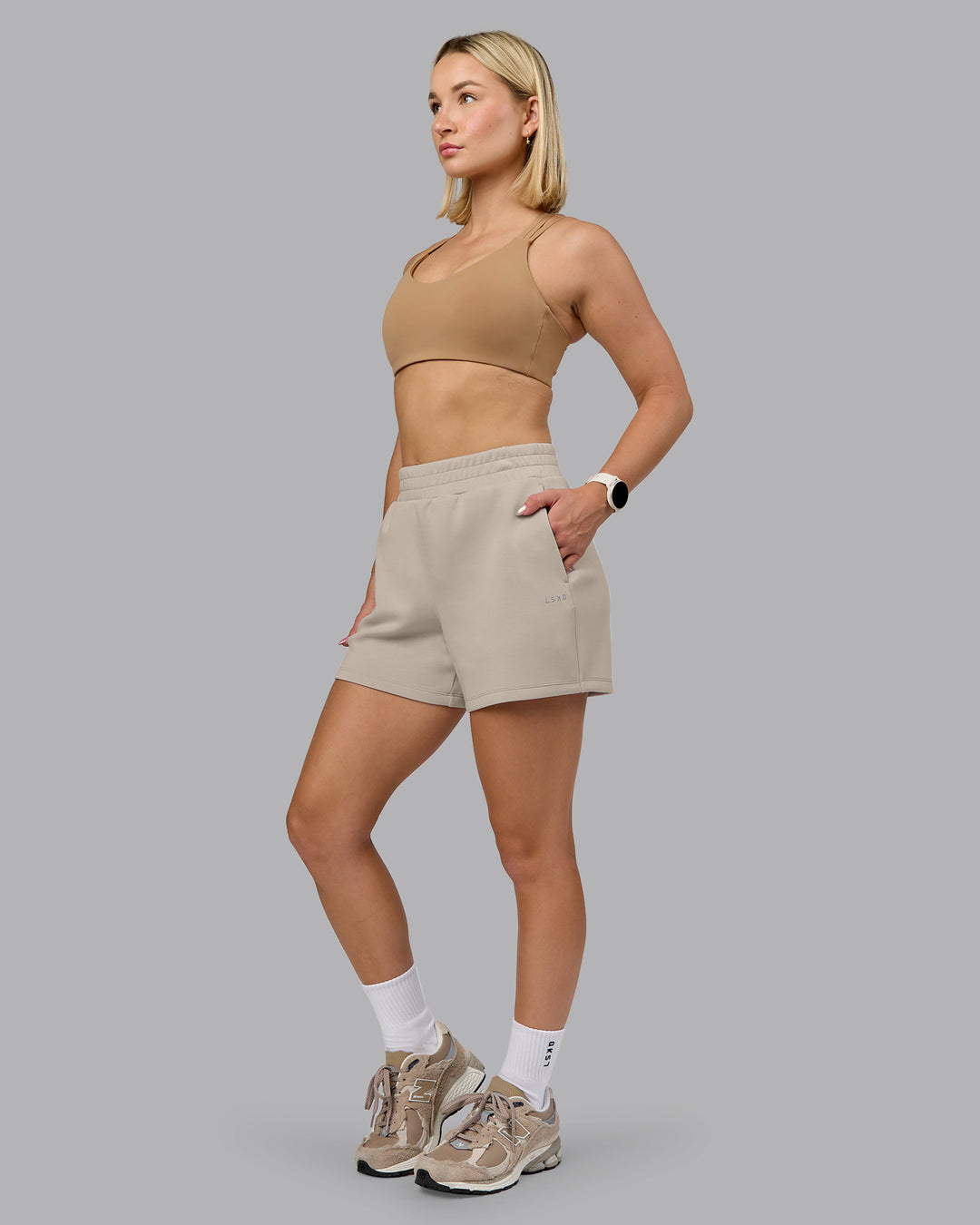Woman wearing Push The Limit Sports Bra - Light Taupe | Model:Halle | Size:S