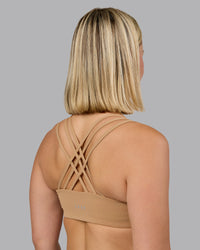 Woman wearing Push The Limit Sports Bra - Light Taupe | Model:Halle | Size:S