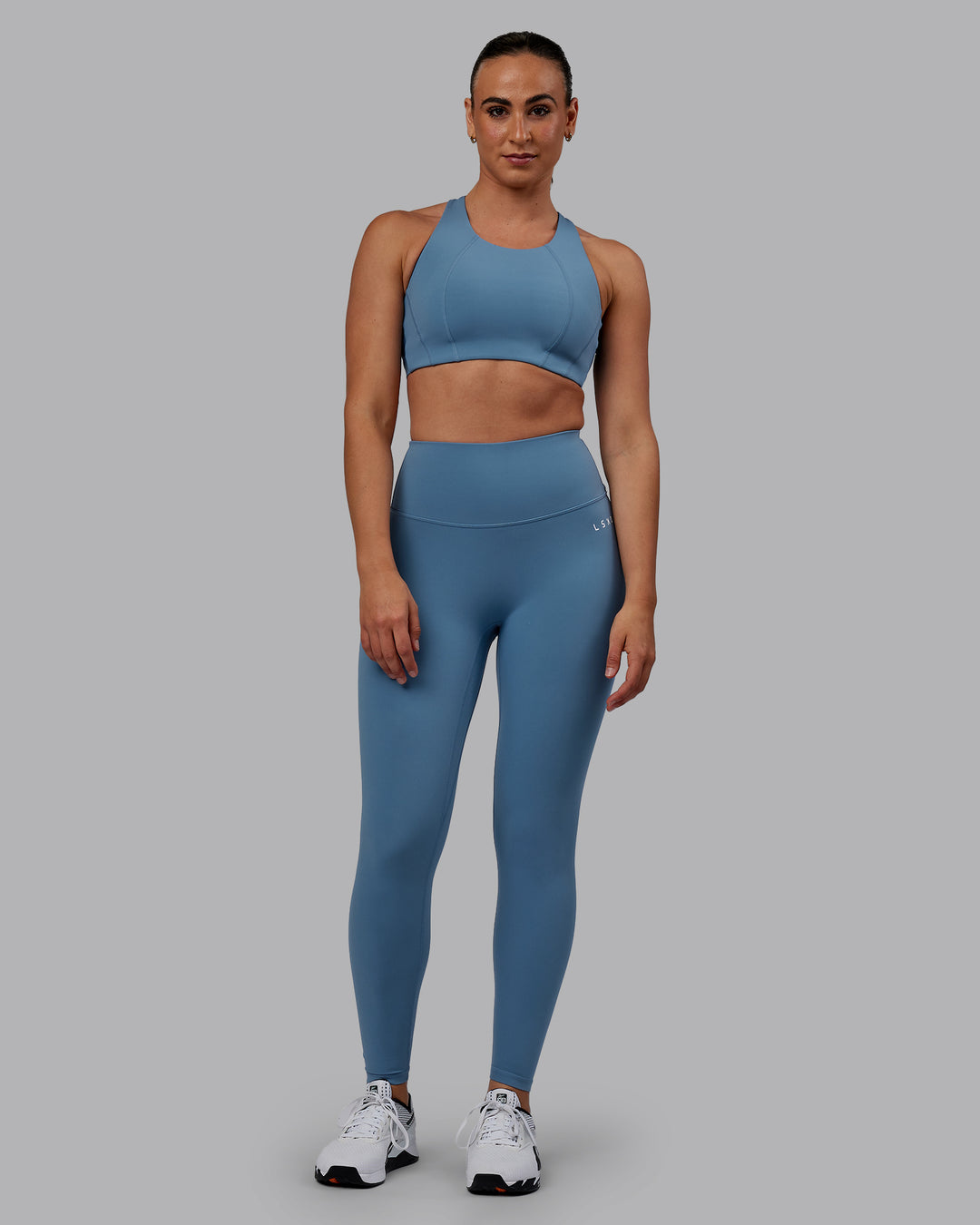 Woman wearing RXD High-Rise Full Length Legging - Elemental Blue