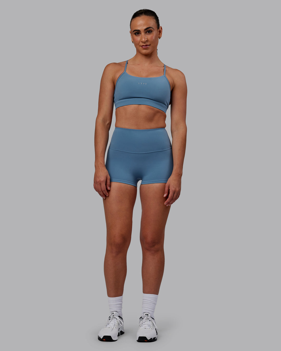 Woman wearing RXD High-Rise 2" Short - Elemental Blue