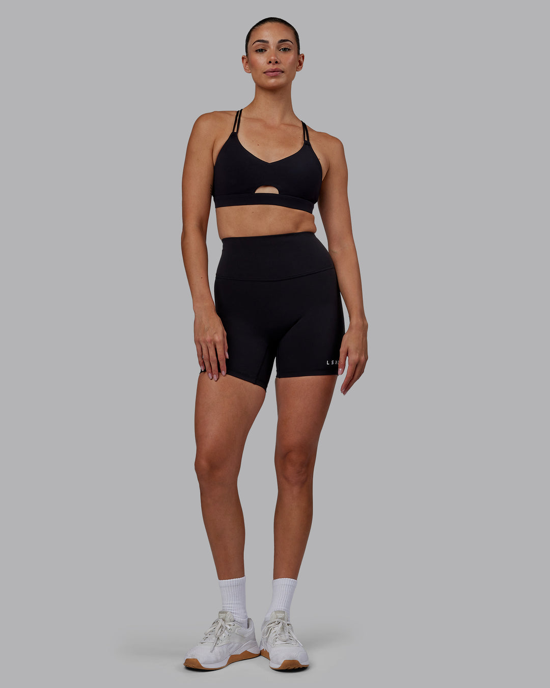 Woman wearing RXD High-Rise 6&quot; Short - Black