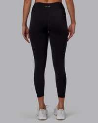 Woman wearing RXD Low-Rise 7/8 Legging - Black | Model:Blaize | Size:S