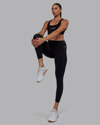 Woman wearing RXD Low-Rise 7/8 Legging - Black | Model:Blaize | Size:S