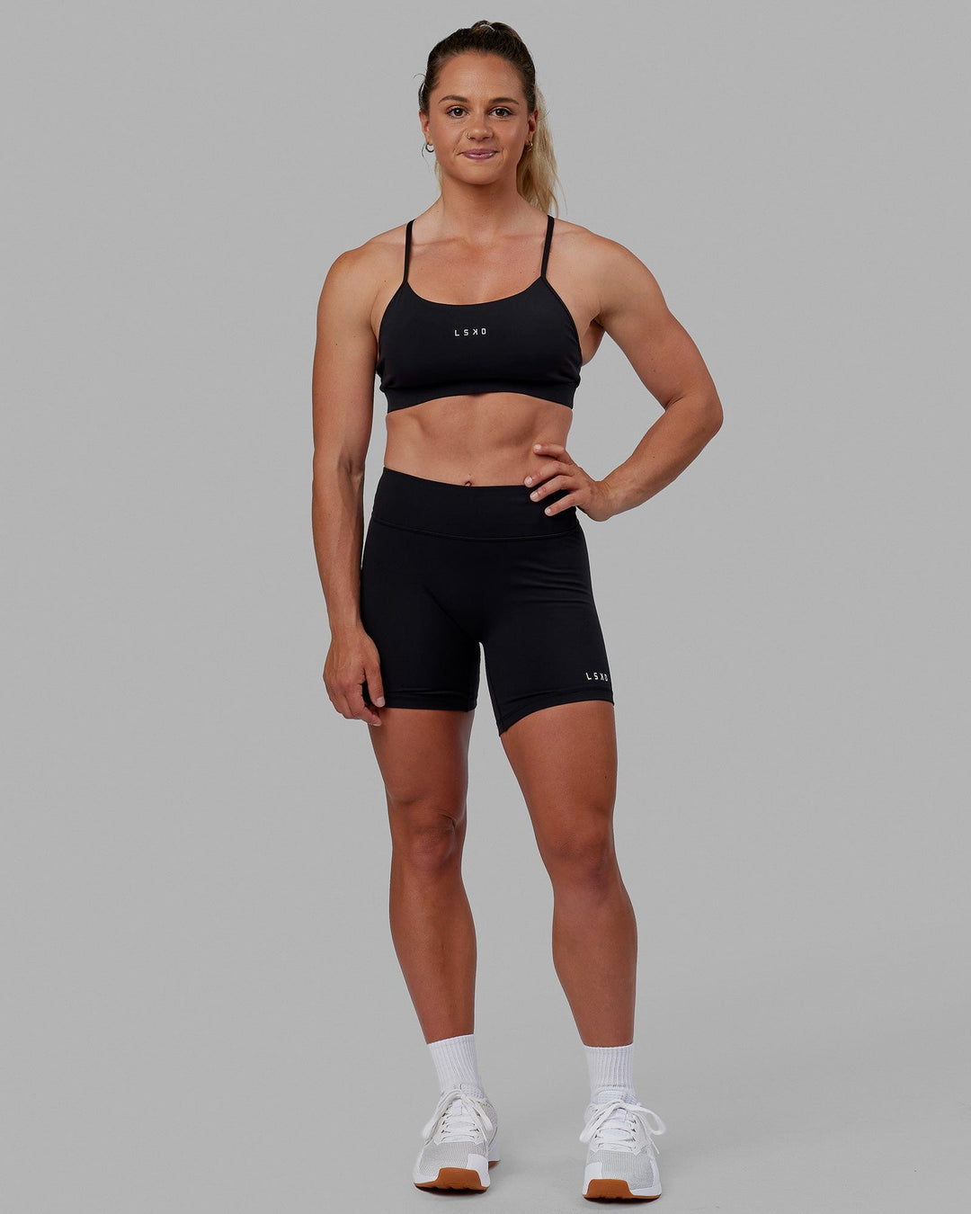 Woman wearing RXD Low-Rise 6&quot; Short - Black