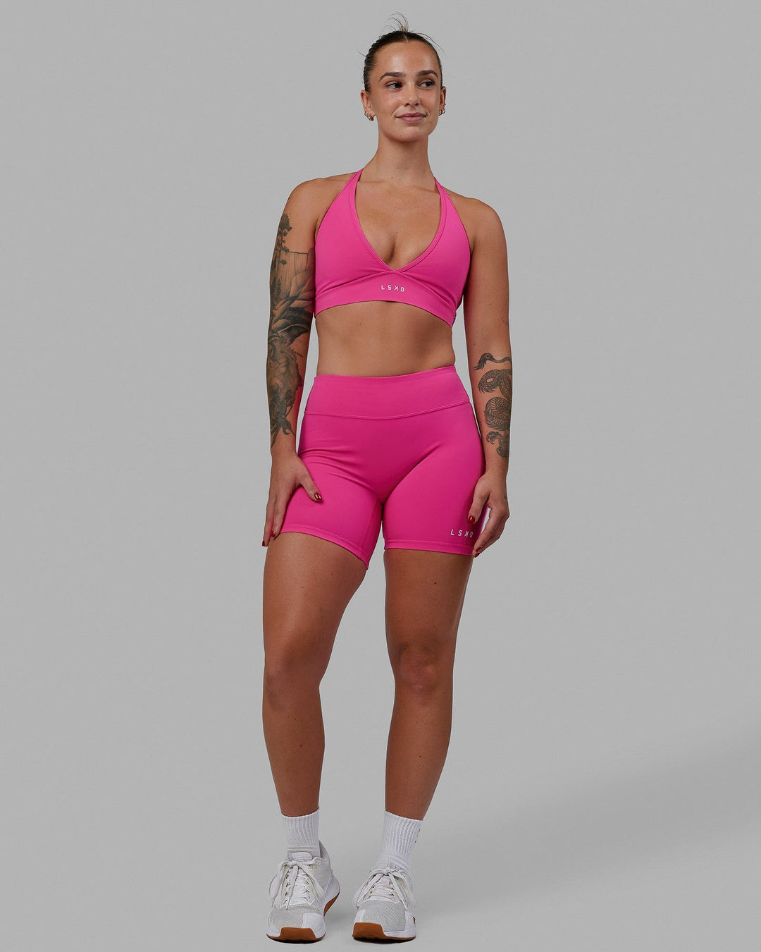 Woman wearing RXD Mid Short Tights - Ultra Pink