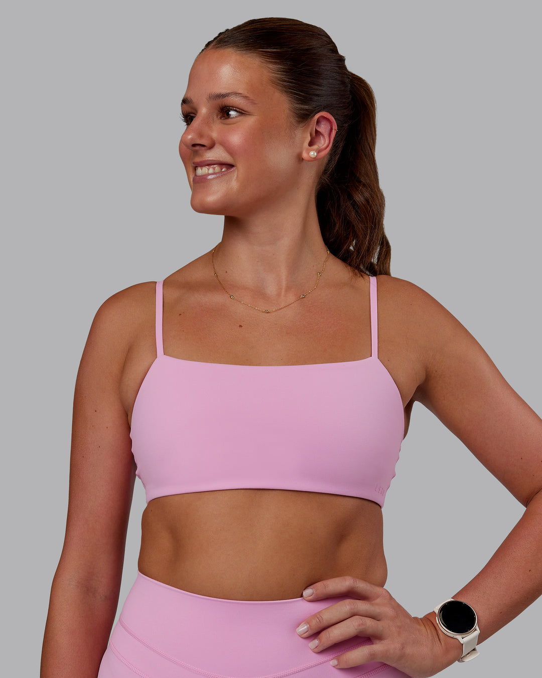 Woman wearing Rebel Heart Sports Bra - Pink Frosting | Model:Phoebe | Size:S