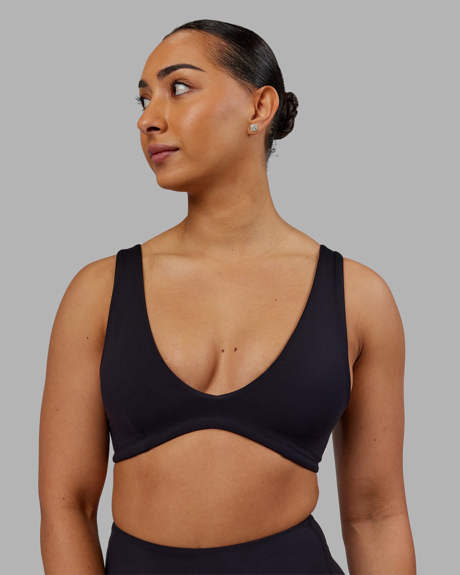 Woman wearing Reform Sports Bra - Black | Model:Ayla | Size:S