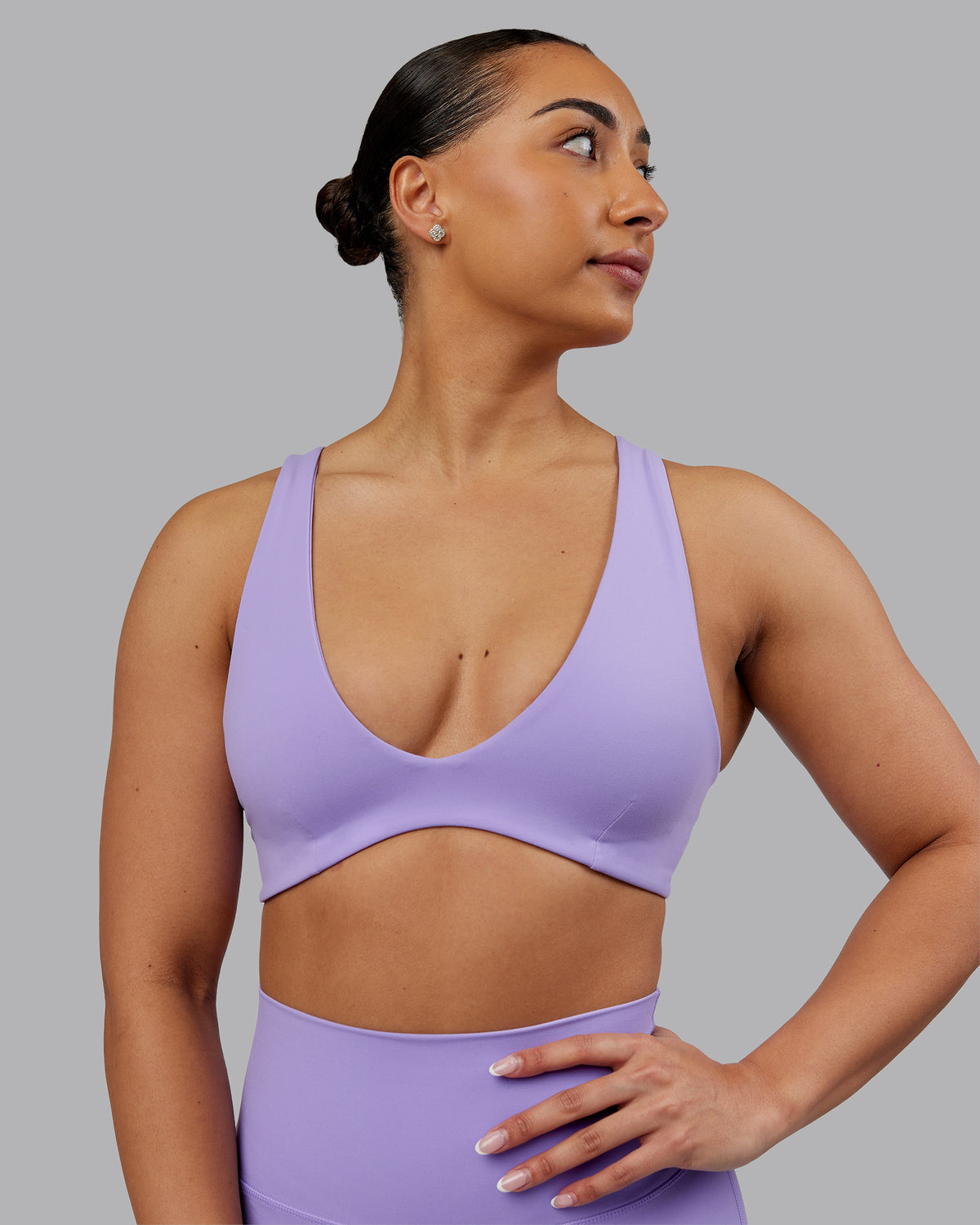 Woman wearing Reform Sports Bra - Violet Ray | Model:Ayla | Size:S