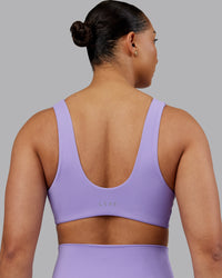 Woman wearing Reform Sports Bra - Violet Ray | Model:Ayla | Size:S