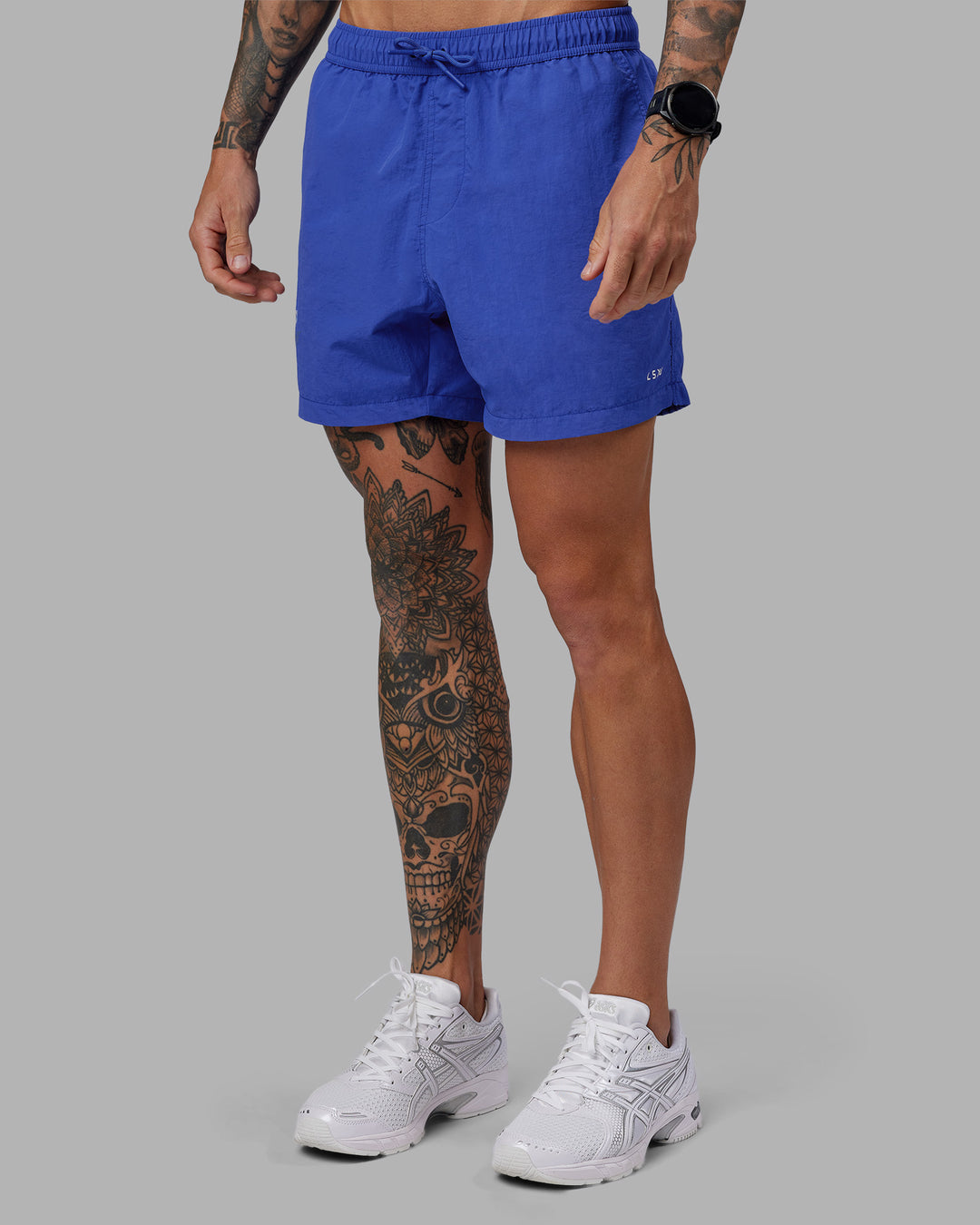Man wearing Relentless Classic 5&quot; Short - Power Cobalt | Model:Tommy | Size:S