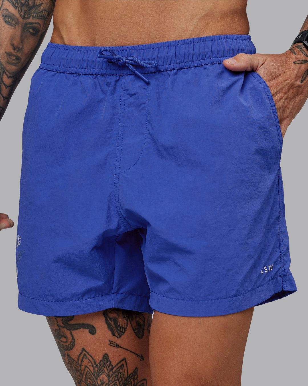 Man wearing Relentless Classic 5&quot; Short - Power Cobalt | Model:Tommy | Size:S