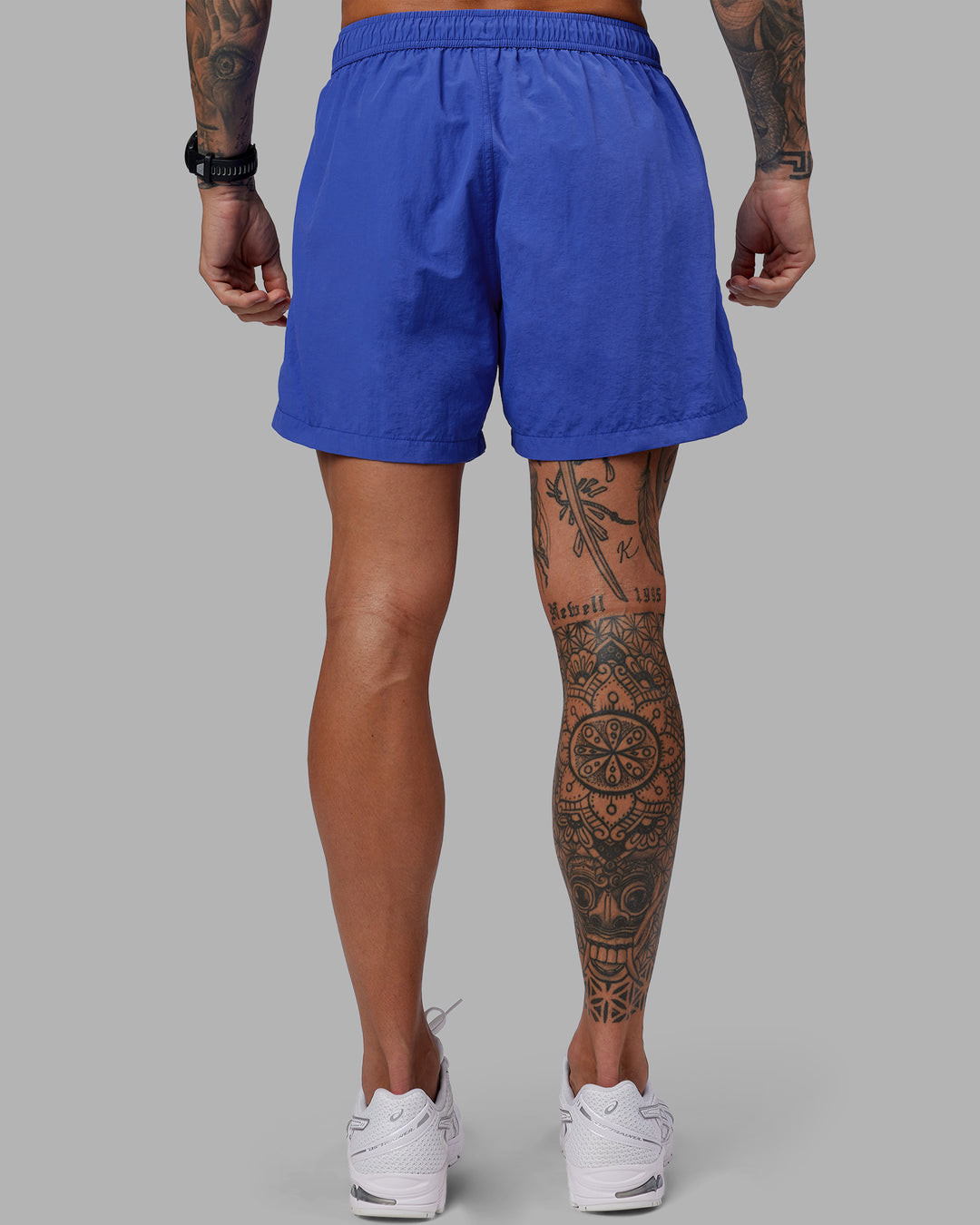 Man wearing Relentless Classic 5&quot; Short - Power Cobalt | Model:Tommy | Size:S