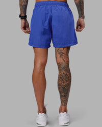 Man wearing Relentless Classic 5" Short - Power Cobalt | Model:Tommy | Size:S