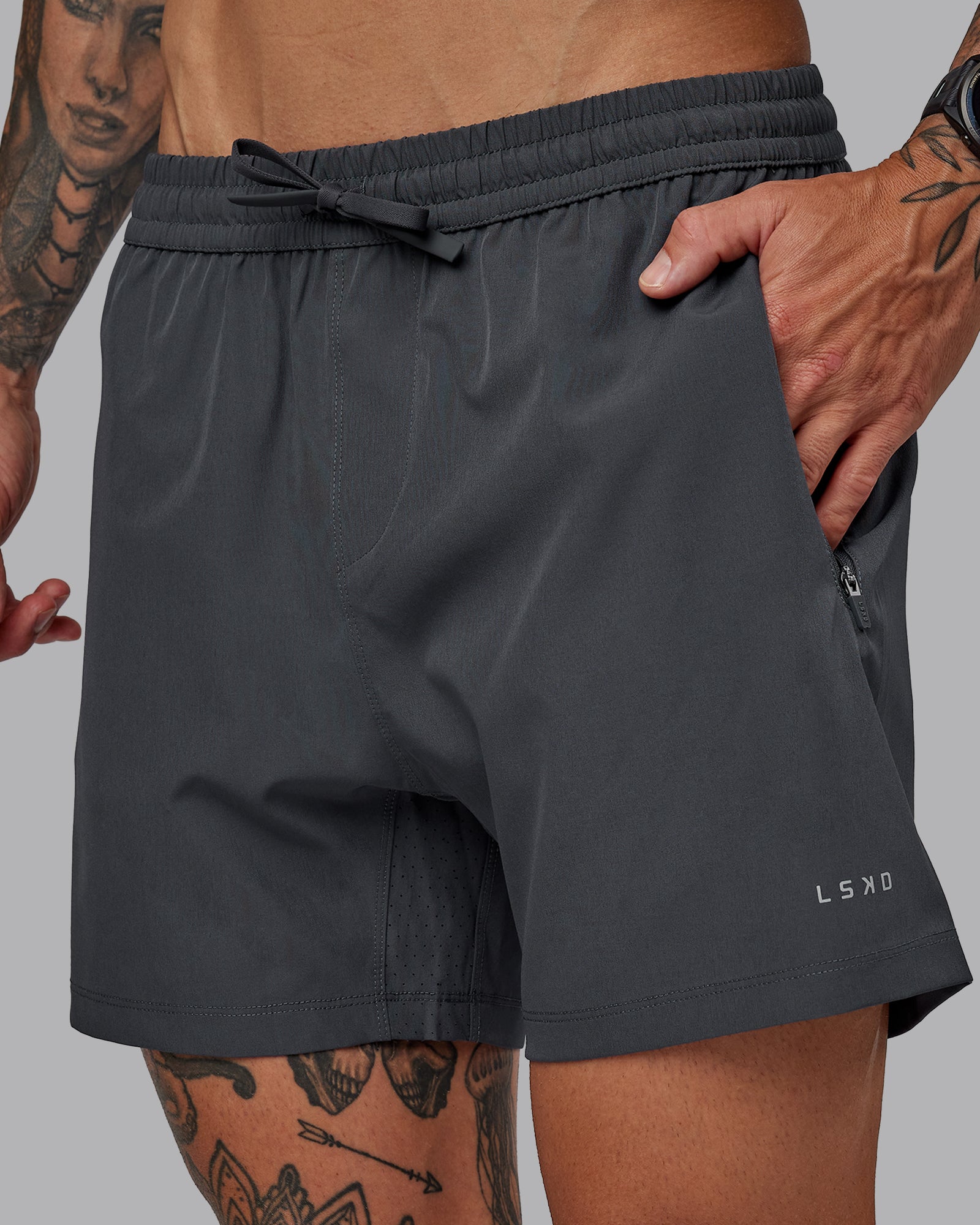 Man wearing Rep 5'' Performance Short in Dark Storm | Size:S