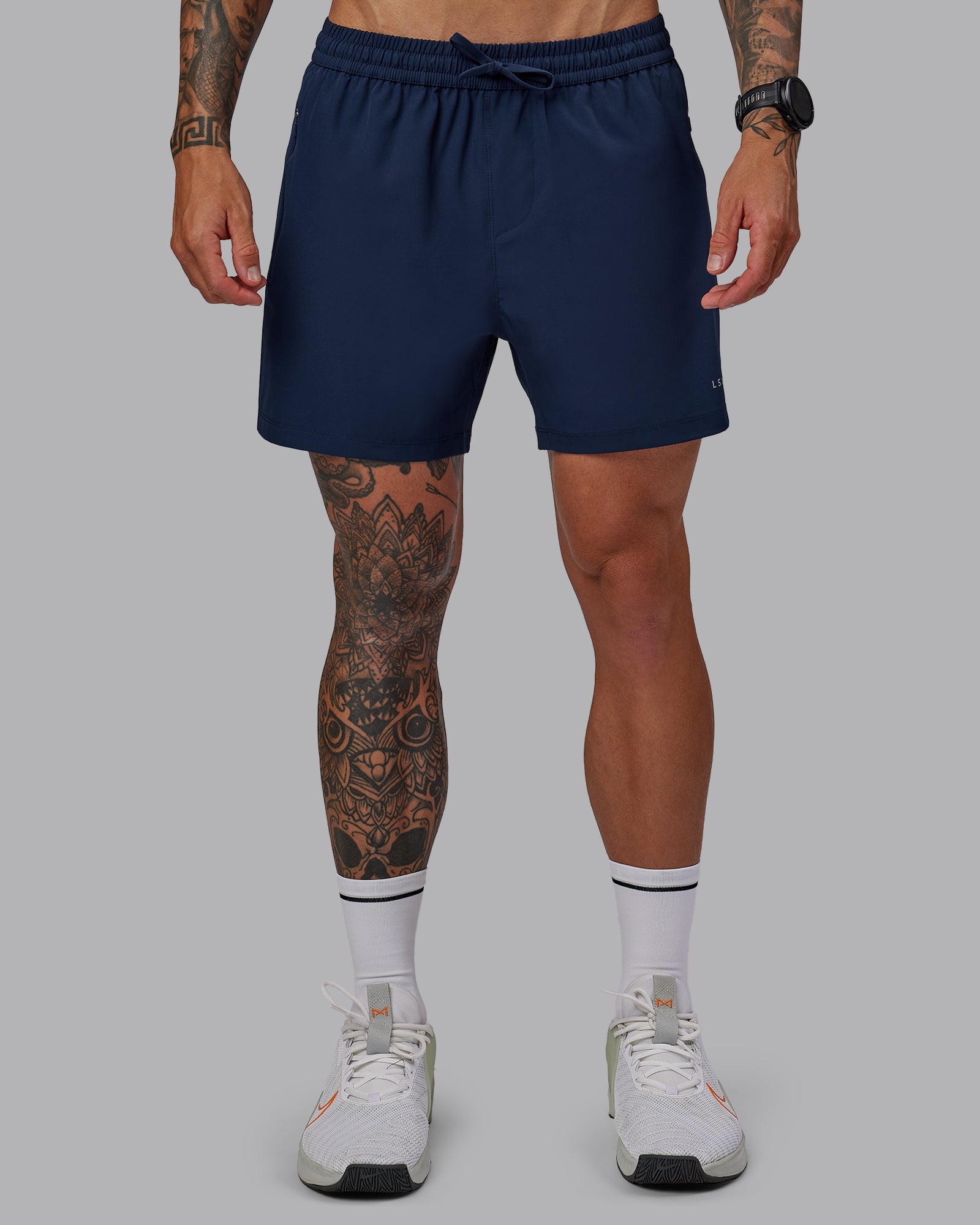 Man wearing Rep 5'' Performance Short in Future Navy | Size:S
