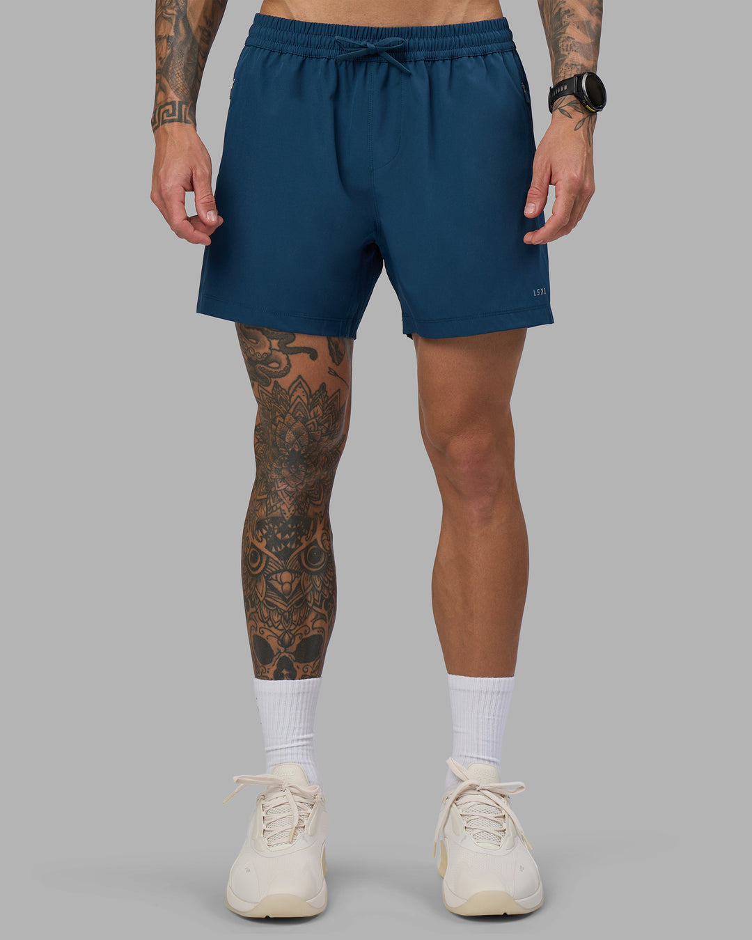 Man wearing Rep 5&quot; Performance Short - Night Sea | Model:Tommy | Size:S