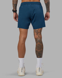 Man wearing Rep 5" Performance Short - Night Sea | Model:Tommy | Size:S