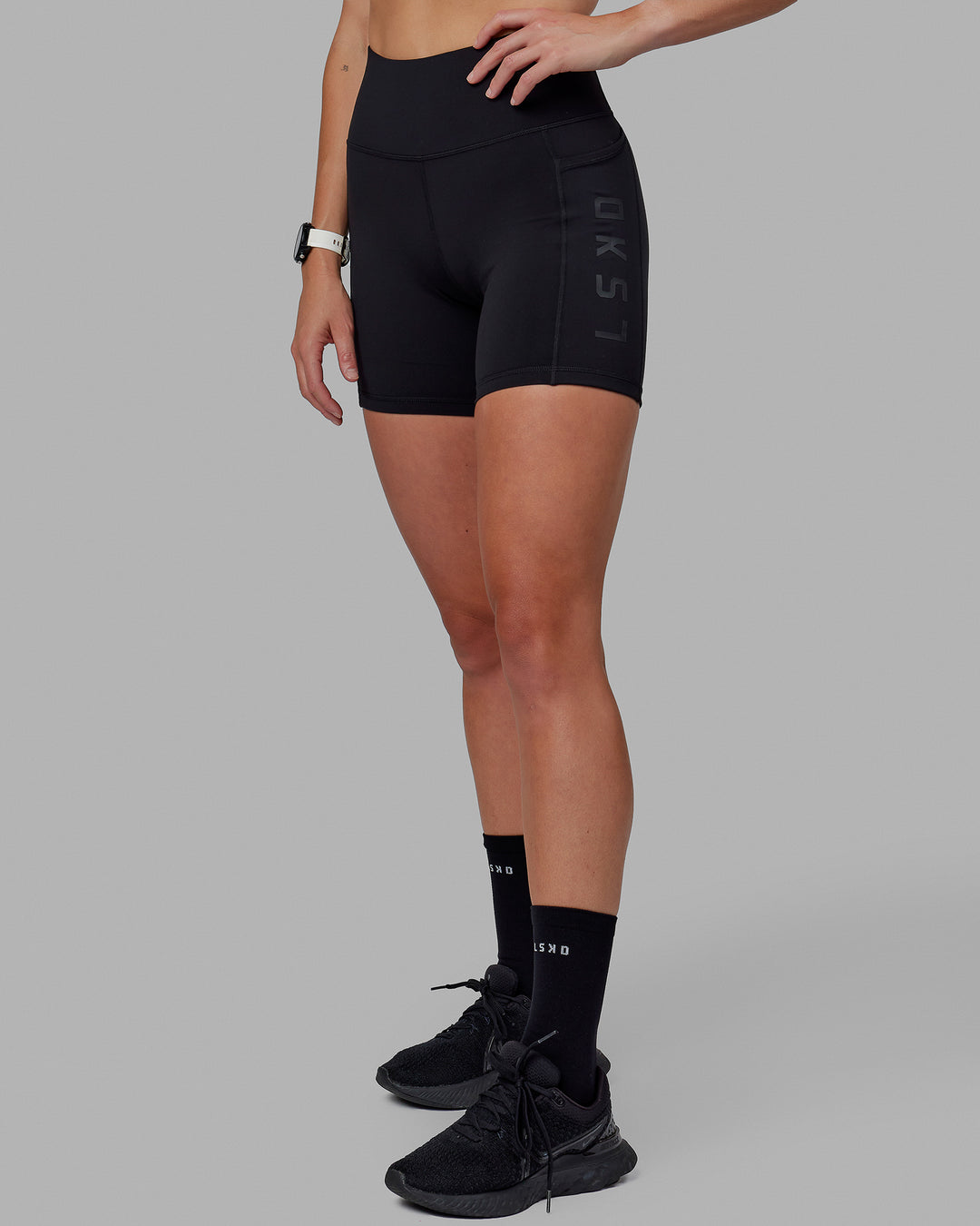 Woman wearing Rep Ultra High-Rise 6&quot; Short Pockets - Black-Black | Model:Shae | Size:S