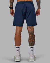 Man wearing Rep 7'' Performance Short in Future Navy | Size:S