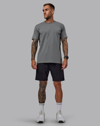 Man wearing Rep 7'' Performance Short in Black-White | Size:S