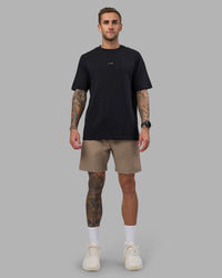 Man wearing Rep 7'' Performance Short - Greige | Model:Tommy | Size:S