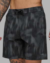 Man wearing Rep 7'' Performance Short - Lunar Glow Print | Model:Tommy | Size:S