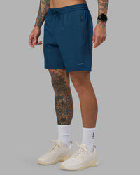 Man wearing Rep 7'' Performance Short - Night Sea | Model:Tommy | Size:S