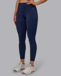 Woman wearing Rep Ultra High-Rise 7/8 Legging Pockets No Logo - Future Navy | Model:Paris | SIze:S