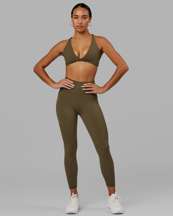 Woman wearing Rep 7/8 Length Tight - Army Green