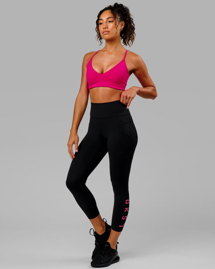 Woman wearing Rep 7/8 Length Tight - Black-Boysenberry