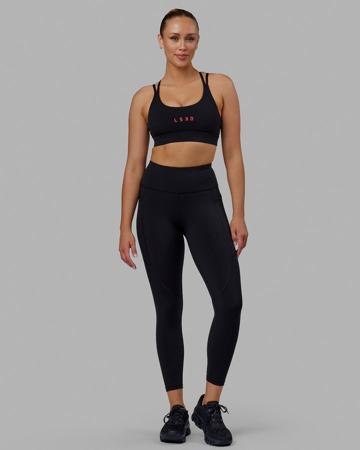 Woman wearing Rep 7/8 Length Tights - Black-Raspberry