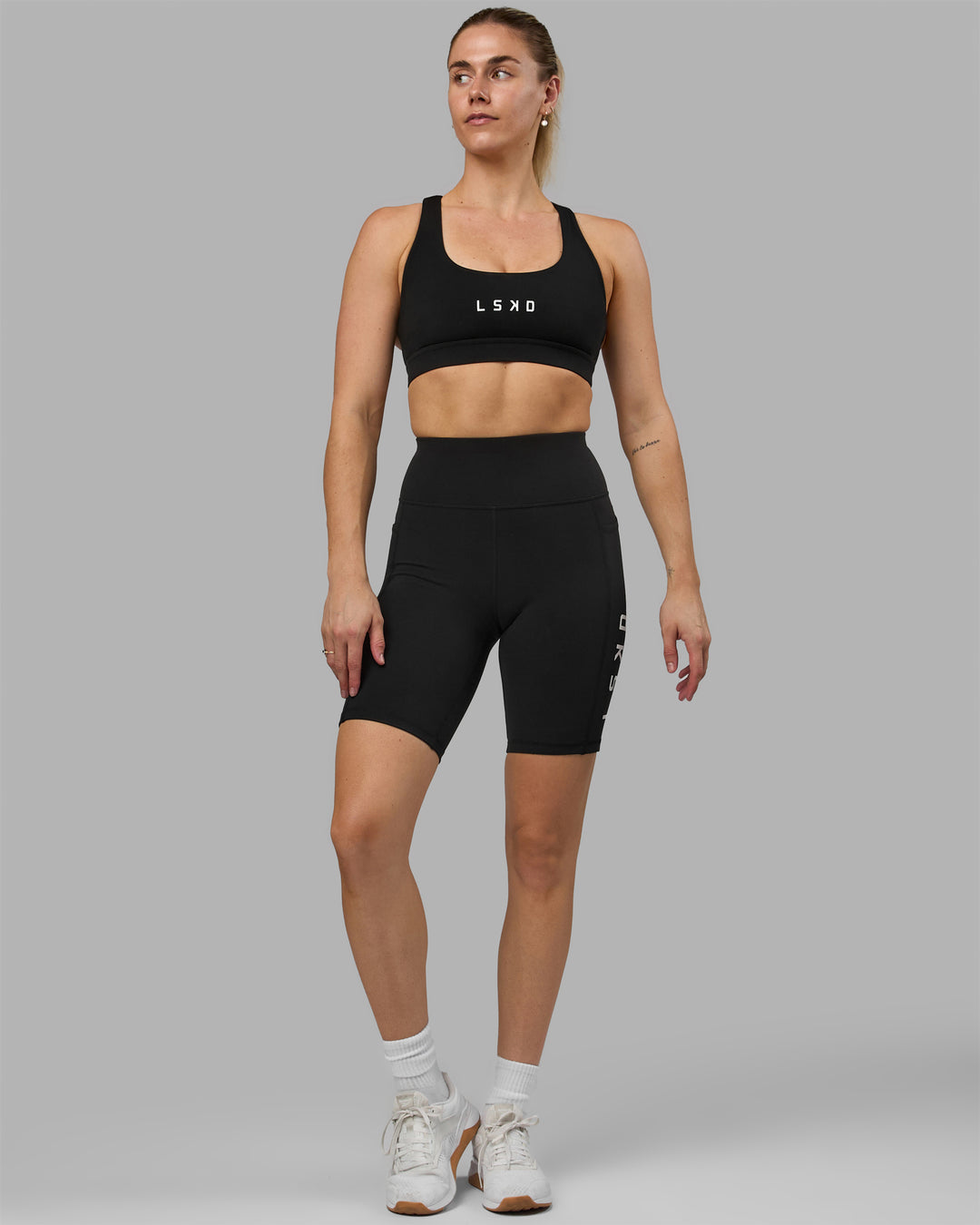 Woman wearing Rep Ultra High-Rise 9&quot; Short Pockets - Black-White | Model:Hannah | Size:S