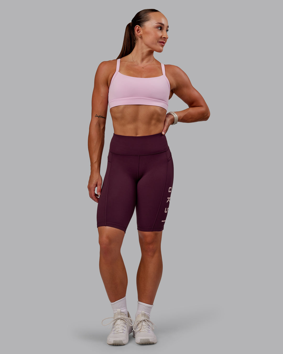 Woman wearing Rep Ultra High-Rise 9" Short Pockets - Cherry Lacquer-Marshmallow | Model:Amber | Size:S