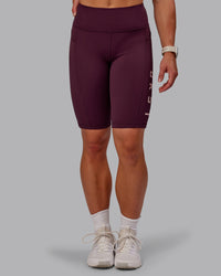 Woman wearing Rep Ultra High-Rise 9" Short Pockets - Cherry Lacquer-Marshmallow | Model:Amber | Size:S