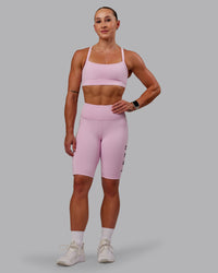 Woman wearing Rep Ultra High-Rise 9" Short Pockets - Marshmallow-Cherry Lacquer | Model:Amber | Size:S | Thumbnail Index: 2