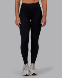 Woman wearing Rep Ultra High-Rise Full Length Legging Pockets - Black-Retro Blue | Model:Hannah | Size:S