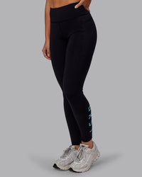 Woman wearing Rep Ultra High-Rise Full Length Legging Pockets - Black-Retro Blue | Model:Hannah | Size:S