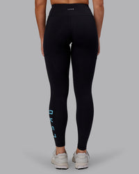 Woman wearing Rep Ultra High-Rise Full Length Legging Pockets - Black-Retro Blue | Model:Hannah | Size:S