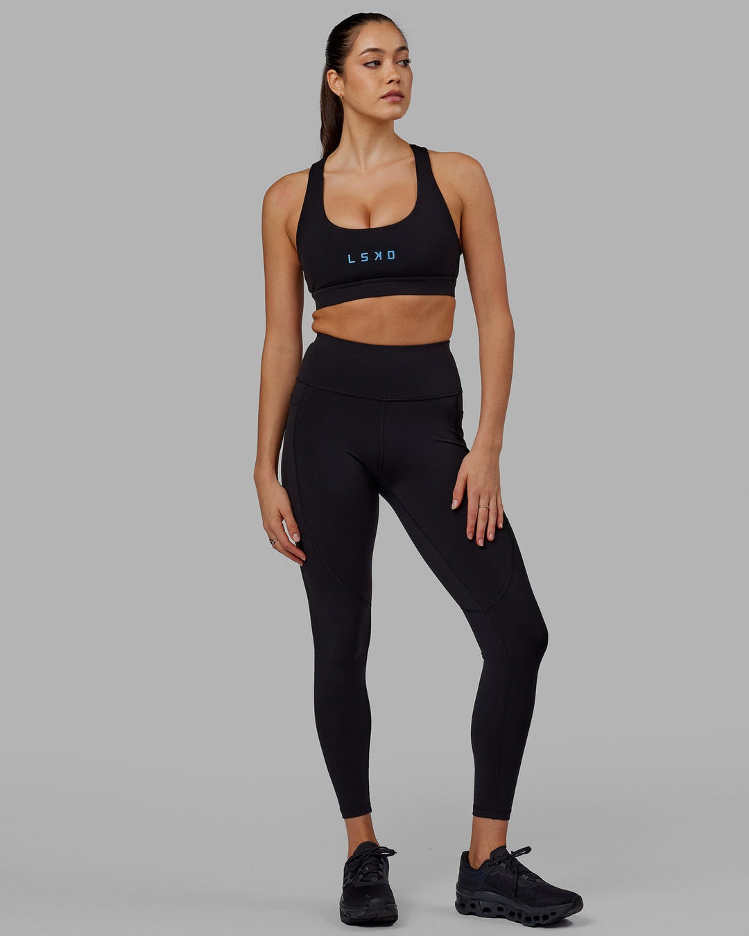 Woman wearing Rep Full Length Tight - Black-Azure Blue