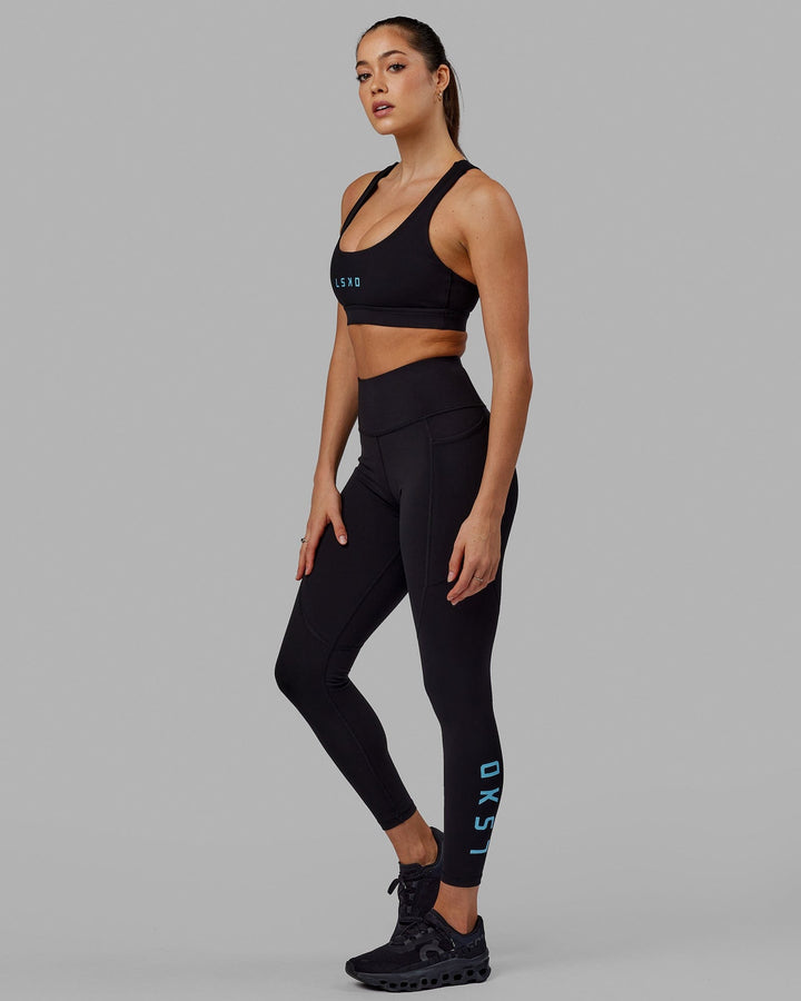 Woman wearing Rep Full Length Tight - Black-Azure Blue