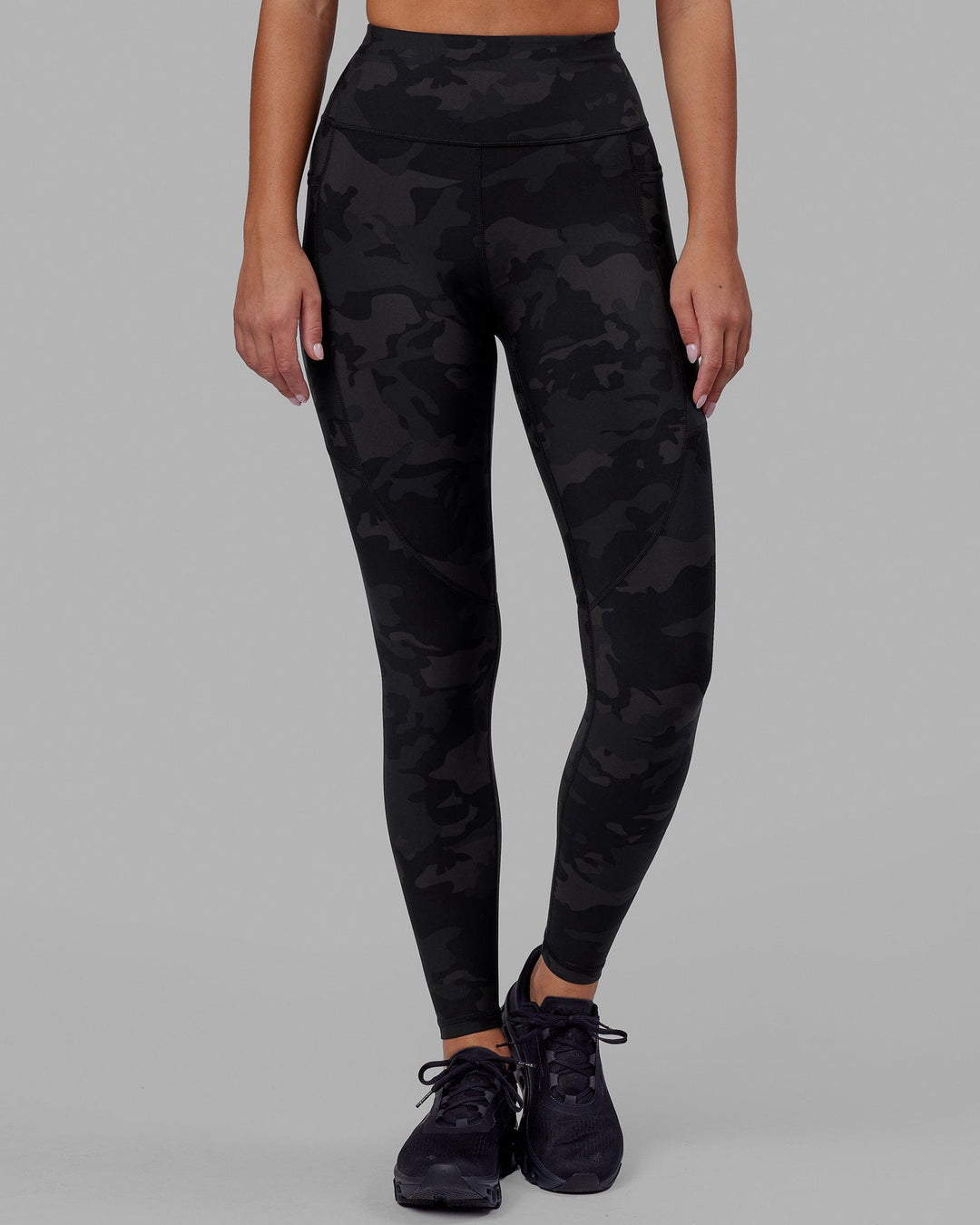 Woman wearing Rep Ultra High-Rise Full Length Legging Pockets - Black Camo | Model:Milly | Size:S